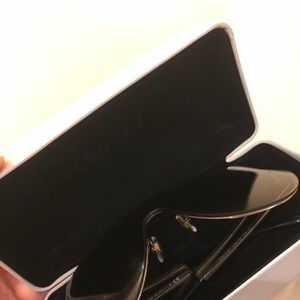 Versace sunglasses with golden hue